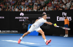 Roger Federer of Switzerland in action during his men's singles final match against Marin Cilic of Croatia at the Australian Open Grand Slam tennis tournament in Melbourne, Australia, 28 January 2018. EPA-EFE/LUKAS COCH AUSTRALIA AND NEW ZEALAND OUT